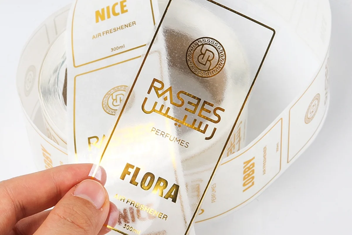 Clear rectangular packaging labels arranged on backing film