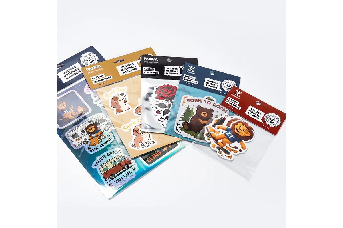Several finished die-cut sticker packs with header cards