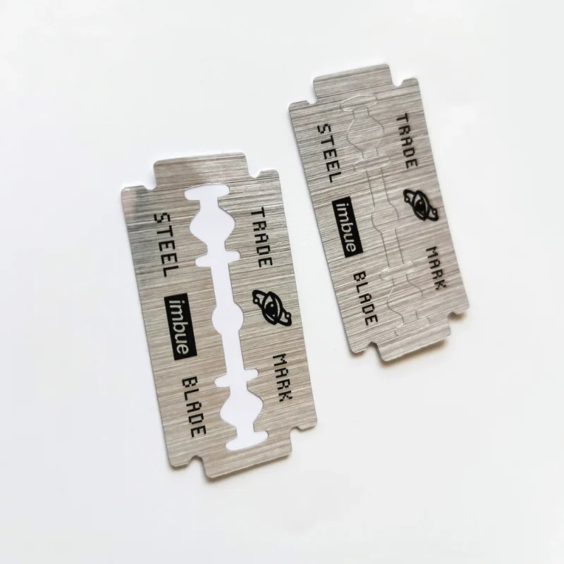 Silver metallic labels with custom razor-blade outlines