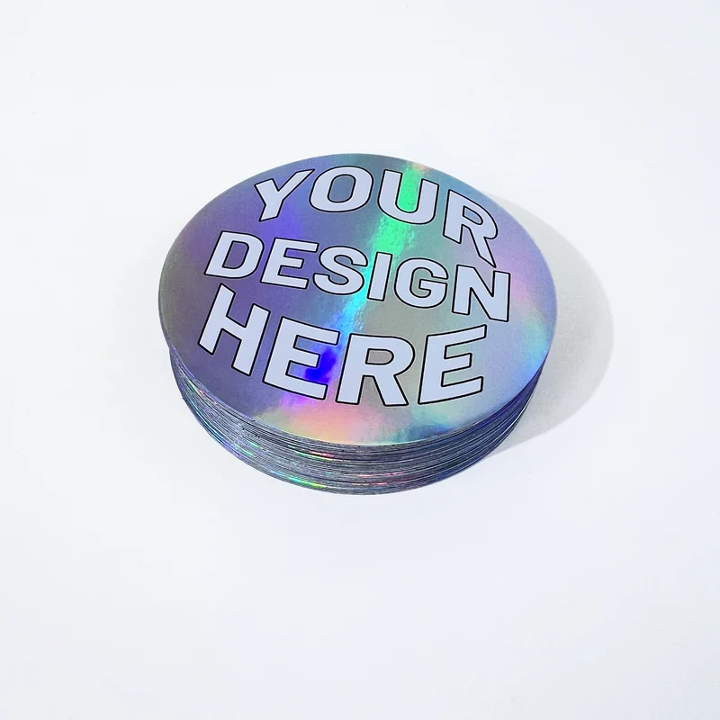Round holographic sticker samples with a rainbow reflection
