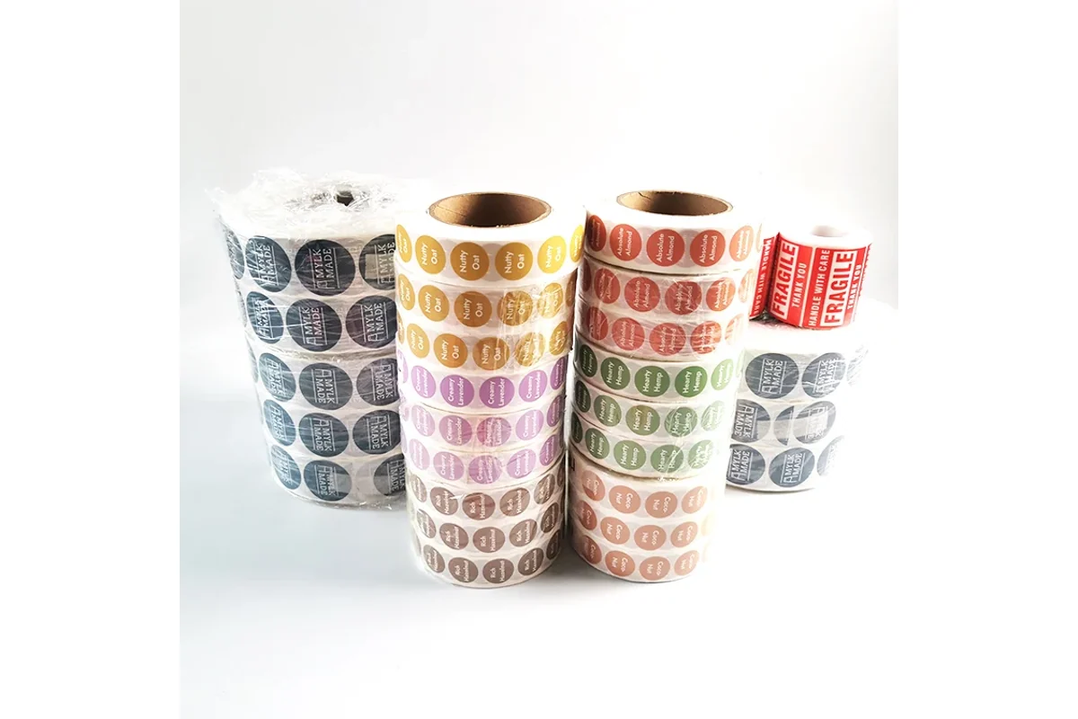 Stacks of label rolls wrapped in protective film.