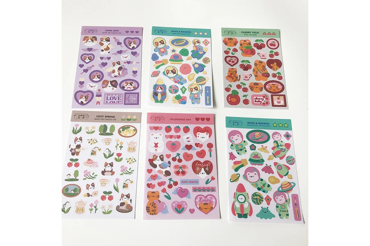 Six coordinated sticker sheets laid out together