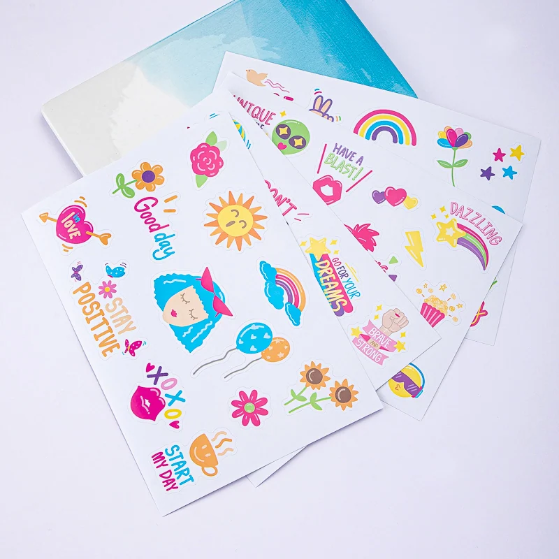 White sticker sheets with colorful illustrated designs