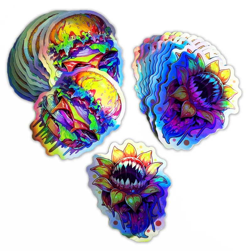 Stacks of floral and skull stickers with a rainbow reflective finish.