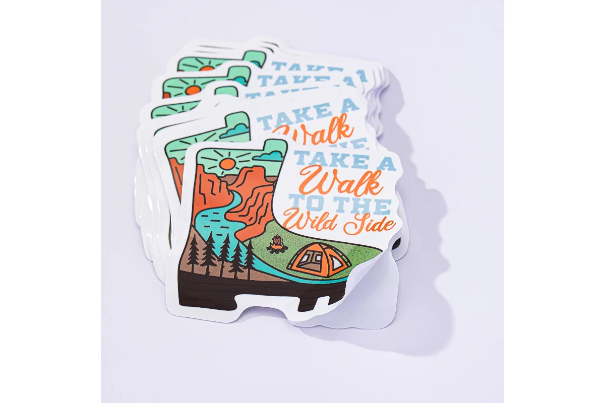 Camping artwork cut into individual stickers with a white border.