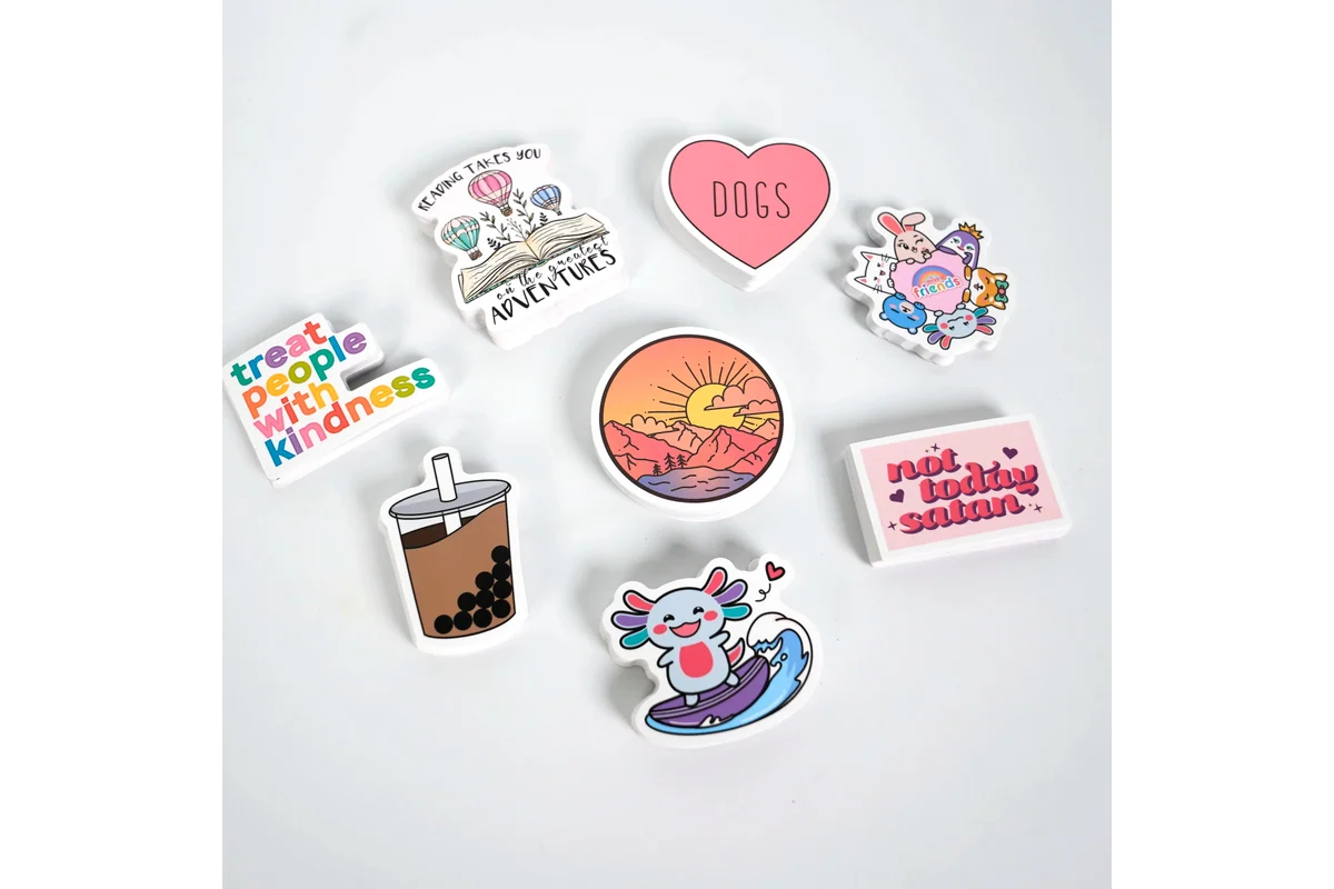 Colorful individual stickers with illustrated drinks, rainbows and lettering.