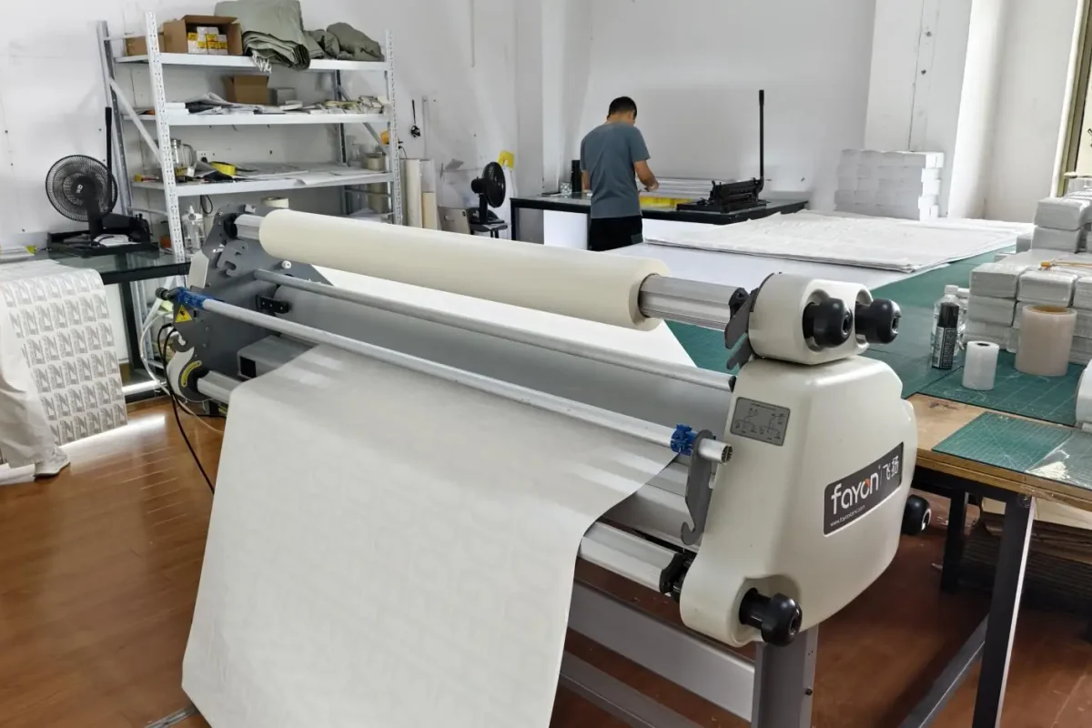 Roll-fed equipment and material in the production workshop.